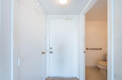 Top-Floor Condo with Panoramic Island Views! Experience the best on Isla Del Sol Yacht and Country Club in Florida - for sale on GolfHomes.com, golf home, golf lot