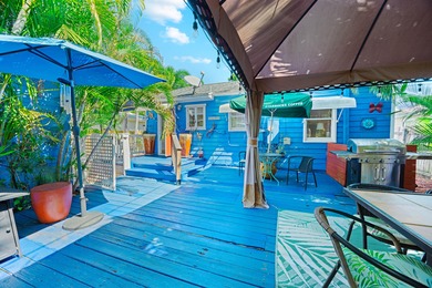 Twice featured in the Cottages of Lake Worth Tour, this is THE on Lake Worth Municipal Golf Course in Florida - for sale on GolfHomes.com, golf home, golf lot