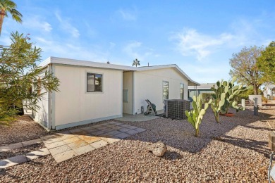 Spacious and fully furnished, this 3-bedroom, 2-bathroom split on Painted Mountain Golf Club in Arizona - for sale on GolfHomes.com, golf home, golf lot