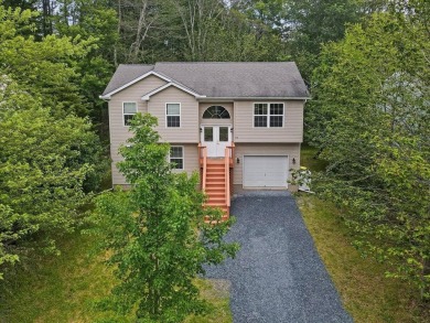 Welcome to a beautifully renovated bi-level home located in a on Pocono Farms Country Club in Pennsylvania - for sale on GolfHomes.com, golf home, golf lot