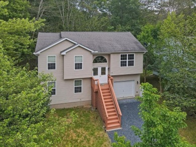 Welcome to a beautifully renovated bi-level home located in a on Pocono Farms Country Club in Pennsylvania - for sale on GolfHomes.com, golf home, golf lot