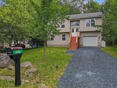 Welcome to a beautifully renovated bi-level home located in a on Pocono Farms Country Club in Pennsylvania - for sale on GolfHomes.com, golf home, golf lot