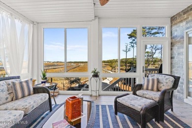 Prepare to be captivated by this extraordinary waterfront on Oak Island Golf Club in North Carolina - for sale on GolfHomes.com, golf home, golf lot