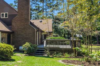 Fall in love with this country cottage style home!   This on Carolina Shores Golf Course in North Carolina - for sale on GolfHomes.com, golf home, golf lot