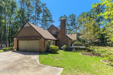 Fall in love with this country cottage style home!   This on Carolina Shores Golf Course in North Carolina - for sale on GolfHomes.com, golf home, golf lot