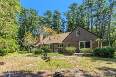 Fall in love with this country cottage style home!   This on Carolina Shores Golf Course in North Carolina - for sale on GolfHomes.com, golf home, golf lot