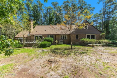 Fall in love with this country cottage style home!   This on Carolina Shores Golf Course in North Carolina - for sale on GolfHomes.com, golf home, golf lot