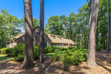 Fall in love with this country cottage style home!   This on Carolina Shores Golf Course in North Carolina - for sale on GolfHomes.com, golf home, golf lot