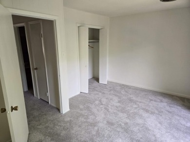 Lovely two-bedroom Condo with brand new carpet upstairs and new on Indian Hills Country Club in Arkansas - for sale on GolfHomes.com, golf home, golf lot