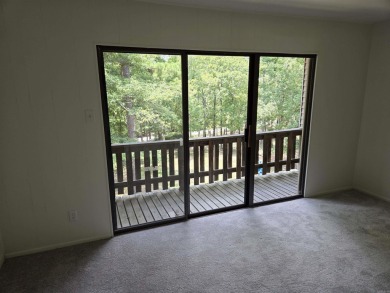 Lovely two-bedroom Condo with brand new carpet upstairs and new on Indian Hills Country Club in Arkansas - for sale on GolfHomes.com, golf home, golf lot