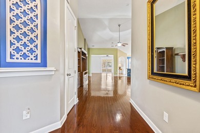 This stunning lakefront home sits perfectly on a peaceful on Wild Wing Plantation in South Carolina - for sale on GolfHomes.com, golf home, golf lot