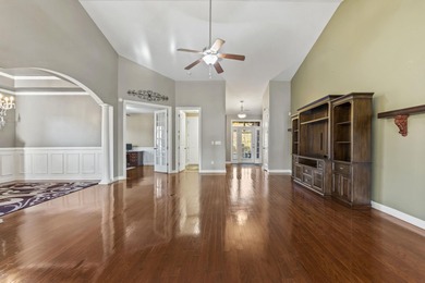 This stunning lakefront home sits perfectly on a peaceful on Wild Wing Plantation in South Carolina - for sale on GolfHomes.com, golf home, golf lot