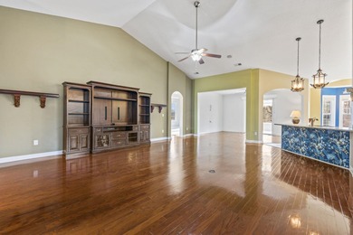 This stunning lakefront home sits perfectly on a peaceful on Wild Wing Plantation in South Carolina - for sale on GolfHomes.com, golf home, golf lot