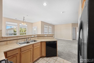This contemporary turn-key 2-bedroom end-unit condo with two on The Broadlands Golf Course in Colorado - for sale on GolfHomes.com, golf home, golf lot