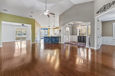 This stunning lakefront home sits perfectly on a peaceful on Wild Wing Plantation in South Carolina - for sale on GolfHomes.com, golf home, golf lot