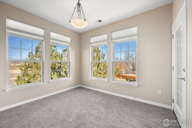 MOTIVATED SELLER! This contemporary turn-key 2-bedroom end-unit on The Broadlands Golf Course in Colorado - for sale on GolfHomes.com, golf home, golf lot