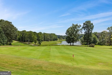 Lovely .68-acre lot perfectly situated at the 11th tee of the on Royal Lakes Golf and Country Club in Georgia - for sale on GolfHomes.com, golf home, golf lot