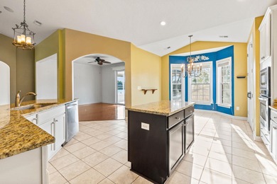 This stunning lakefront home sits perfectly on a peaceful on Wild Wing Plantation in South Carolina - for sale on GolfHomes.com, golf home, golf lot