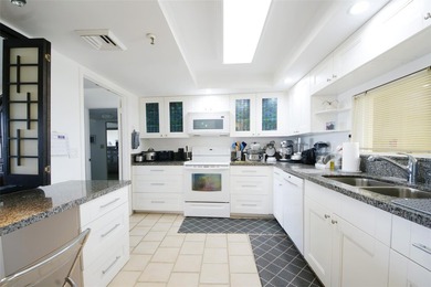 Enjoy breathtaking panoramic views from this beautifully on The President Country Club in Florida - for sale on GolfHomes.com, golf home, golf lot