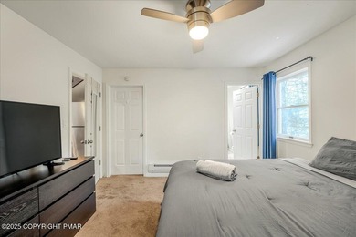 Do not miss this turnkey, fully furnished, and STR-ready in on Pocono Farms Country Club in Pennsylvania - for sale on GolfHomes.com, golf home, golf lot