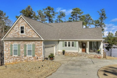 Welcome to 310 Misty Cove, a stunning waterfront home nestled on on Monticello Golf Club At Savannah Lakes in South Carolina - for sale on GolfHomes.com, golf home, golf lot