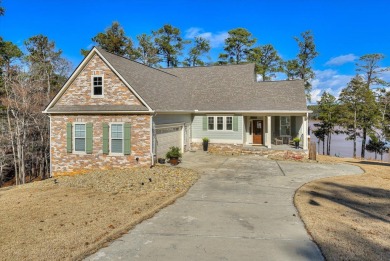 Welcome to 310 Misty Cove, a stunning waterfront home nestled on on Monticello Golf Club At Savannah Lakes in South Carolina - for sale on GolfHomes.com, golf home, golf lot