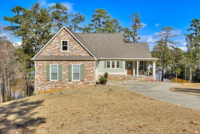 Welcome to 310 Misty Cove, a stunning waterfront home nestled on on Monticello Golf Club At Savannah Lakes in South Carolina - for sale on GolfHomes.com, golf home, golf lot