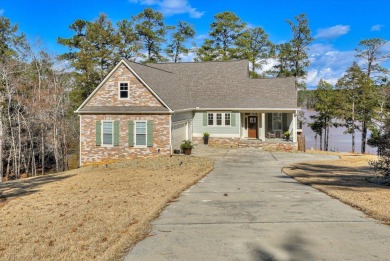 Welcome to 310 Misty Cove, a stunning waterfront home nestled on on Monticello Golf Club At Savannah Lakes in South Carolina - for sale on GolfHomes.com, golf home, golf lot