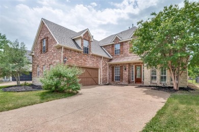 Resort-Style Living with Stunning Water Views in Gated Frisco on Heritage Lakes - Par 3 - 9 Hole Course in Texas - for sale on GolfHomes.com, golf home, golf lot