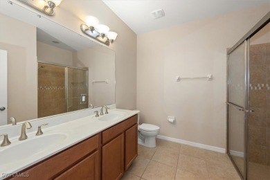 This beautifully designed, open concept home overlooks the 12th on Herons Glen Golf and Country Club in Florida - for sale on GolfHomes.com, golf home, golf lot