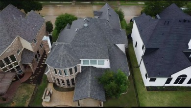 Resort-Style Living with Stunning Water Views in Gated Frisco on Heritage Lakes - Par 3 - 9 Hole Course in Texas - for sale on GolfHomes.com, golf home, golf lot