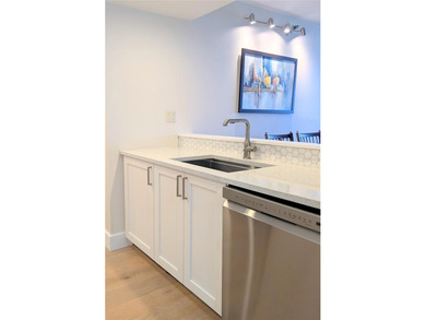 Welcome to this fully renovated 2-bedroom, 2-bath residence on Isla Del Sol Yacht and Country Club in Florida - for sale on GolfHomes.com, golf home, golf lot