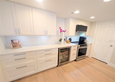 Welcome to this fully renovated 2-bedroom, 2-bath residence on Isla Del Sol Yacht and Country Club in Florida - for sale on GolfHomes.com, golf home, golf lot