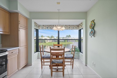 Meticulously maintained corner unit boasting PANORAMIC lake on Jonathans Landing Golf Club in Florida - for sale on GolfHomes.com, golf home, golf lot