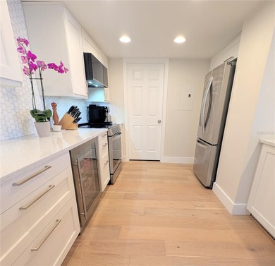 Welcome to this fully renovated 2-bedroom, 2-bath residence on Isla Del Sol Yacht and Country Club in Florida - for sale on GolfHomes.com, golf home, golf lot