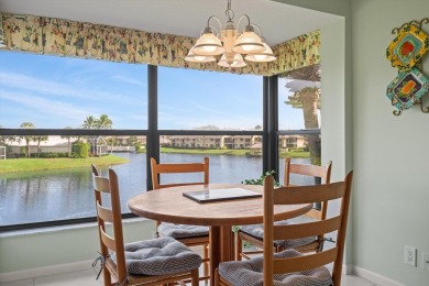 Meticulously maintained corner unit boasting PANORAMIC lake on Jonathans Landing Golf Club in Florida - for sale on GolfHomes.com, golf home, golf lot