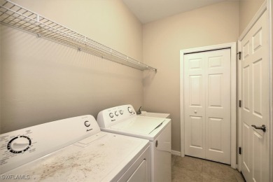 This beautifully designed, open concept home overlooks the 12th on Herons Glen Golf and Country Club in Florida - for sale on GolfHomes.com, golf home, golf lot