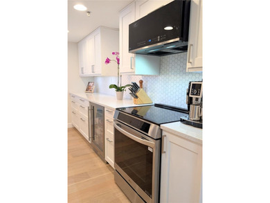 Welcome to this fully renovated 2-bedroom, 2-bath residence on Isla Del Sol Yacht and Country Club in Florida - for sale on GolfHomes.com, golf home, golf lot