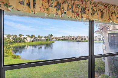 Meticulously maintained corner unit boasting PANORAMIC lake on Jonathans Landing Golf Club in Florida - for sale on GolfHomes.com, golf home, golf lot