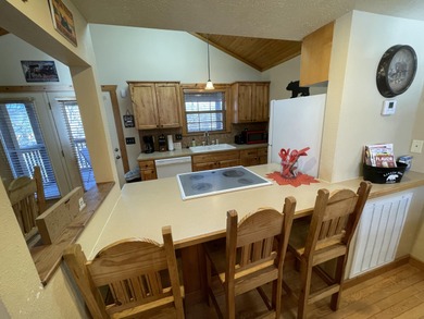 Looking for the perfect vacation retreat for your family to on Ledgestone Country Club and Golf Course in Missouri - for sale on GolfHomes.com, golf home, golf lot