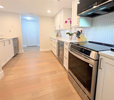 Welcome to this fully renovated 2-bedroom, 2-bath residence on Isla Del Sol Yacht and Country Club in Florida - for sale on GolfHomes.com, golf home, golf lot