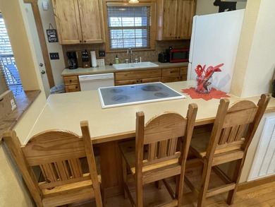 Looking for the perfect vacation retreat for your family to on Ledgestone Country Club and Golf Course in Missouri - for sale on GolfHomes.com, golf home, golf lot