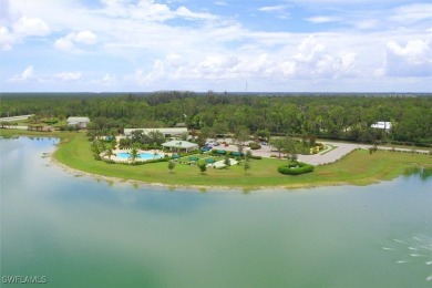 This beautifully designed, open concept home overlooks the 12th on Herons Glen Golf and Country Club in Florida - for sale on GolfHomes.com, golf home, golf lot