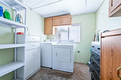 Welcome home to this beautifully maintained park model in the on Riverview Golf Course in Arizona - for sale on GolfHomes.com, golf home, golf lot