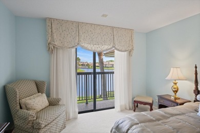 Meticulously maintained corner unit boasting PANORAMIC lake on Jonathans Landing Golf Club in Florida - for sale on GolfHomes.com, golf home, golf lot