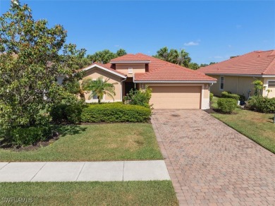 This beautifully designed, open concept home overlooks the 12th on Herons Glen Golf and Country Club in Florida - for sale on GolfHomes.com, golf home, golf lot