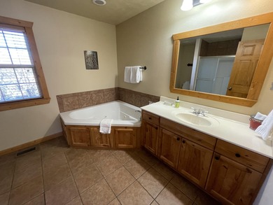 Looking for the perfect vacation retreat for your family to on Ledgestone Country Club and Golf Course in Missouri - for sale on GolfHomes.com, golf home, golf lot