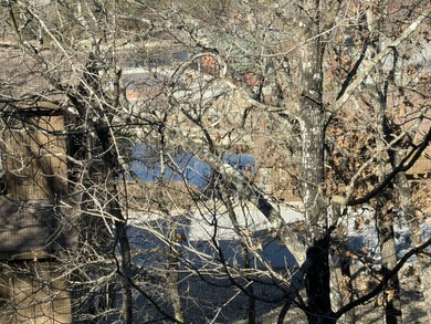 Looking for the perfect vacation retreat for your family to on Ledgestone Country Club and Golf Course in Missouri - for sale on GolfHomes.com, golf home, golf lot