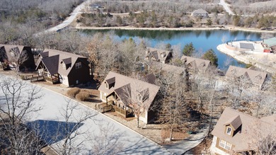 Looking for the perfect vacation retreat for your family to on Ledgestone Country Club and Golf Course in Missouri - for sale on GolfHomes.com, golf home, golf lot