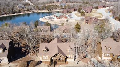 Looking for the perfect vacation retreat for your family to on Ledgestone Country Club and Golf Course in Missouri - for sale on GolfHomes.com, golf home, golf lot